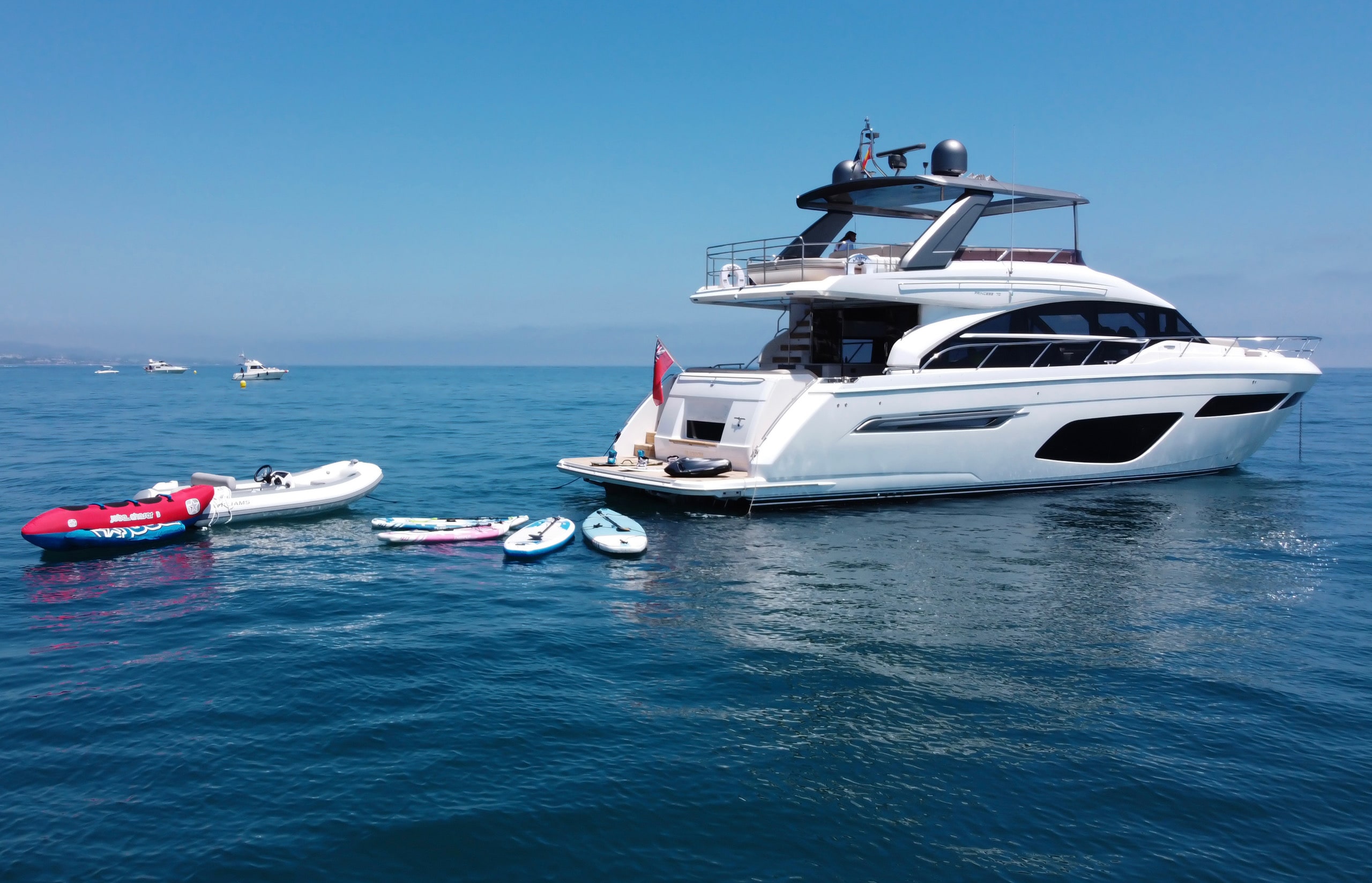 Sleek yachts with water toys for everyone
